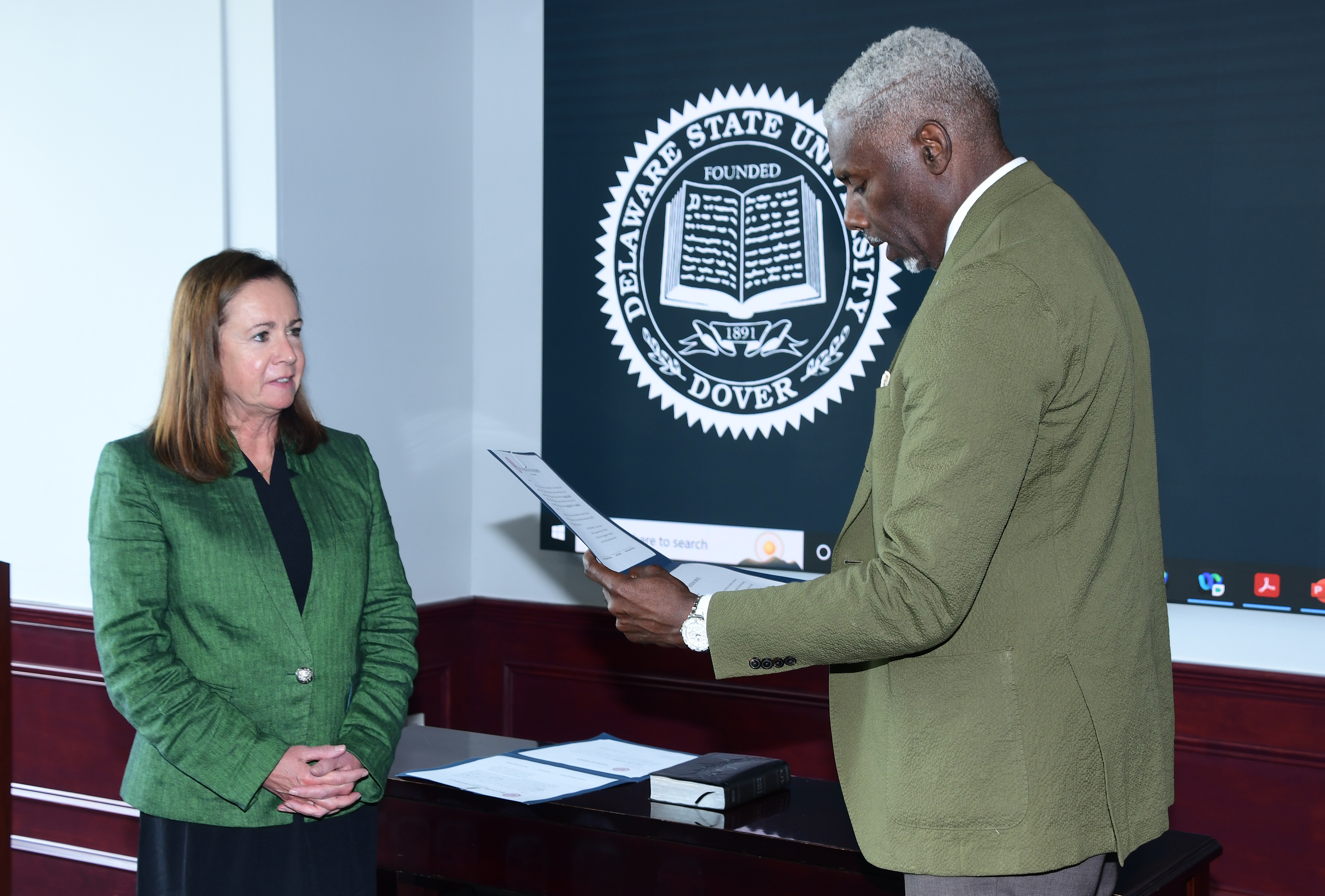 Dr. Janice E. Nevin is sworn in for a six-year term as a member of the DSU Board of Trustees.