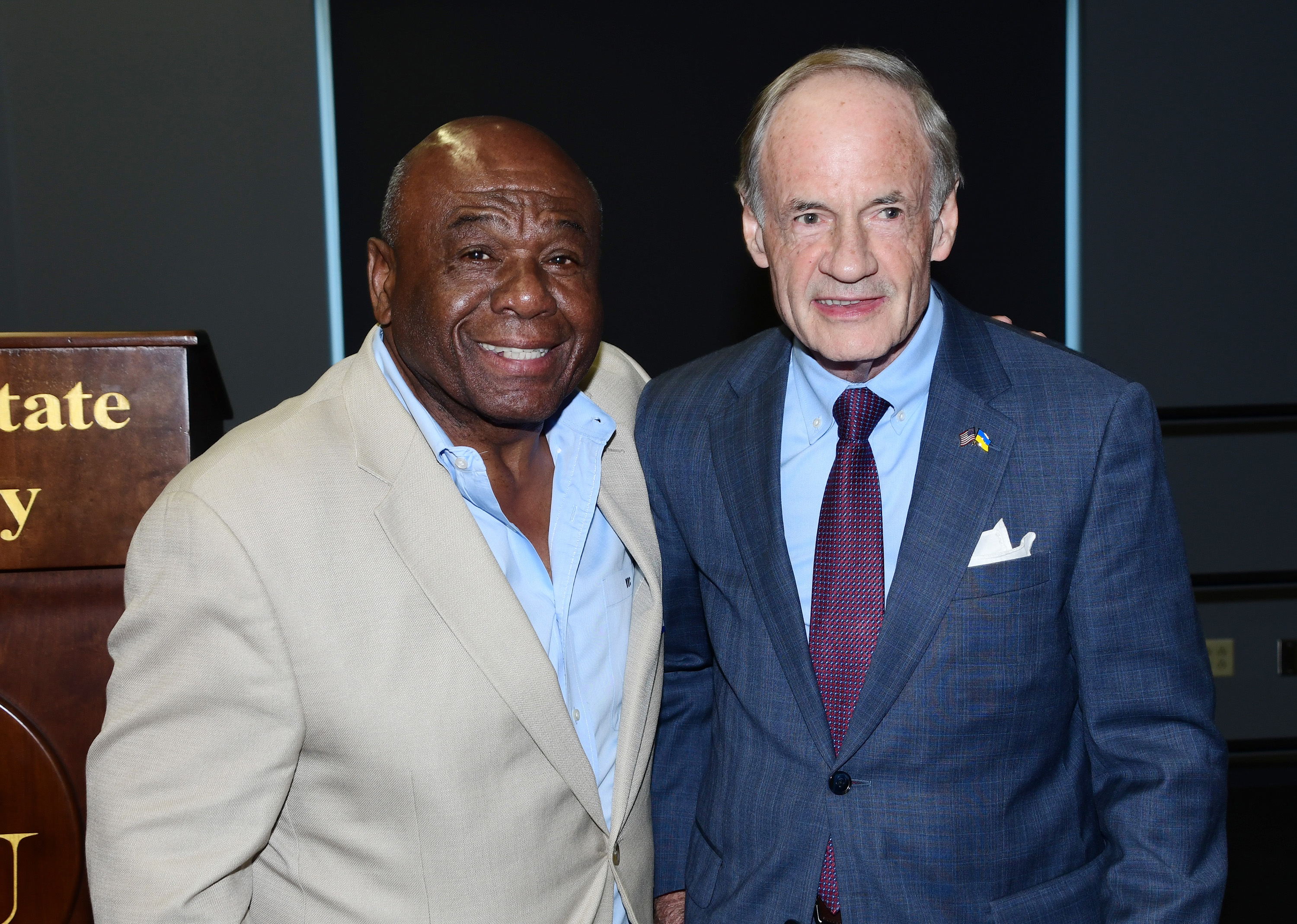 DSU Board of Trustees member Bill Collick shares a moment with Sen. Tom Carper.