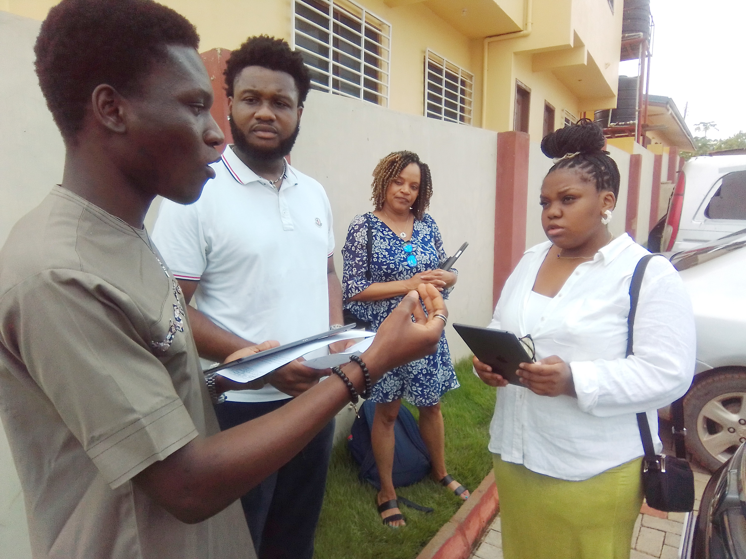 An Ghanaian is interviewed by Matthew Charles and Autumn Flowers