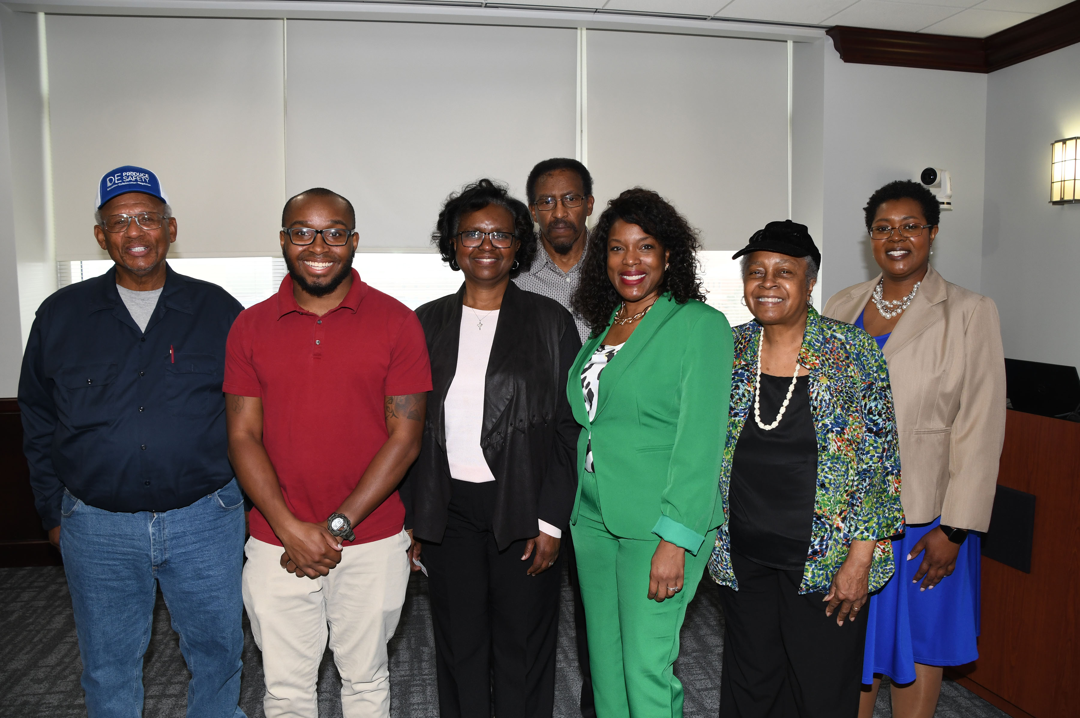 Dr. Cherese Winstead Casson (in green) stands with the 1st State African American Farmers Association, which attended the event.
