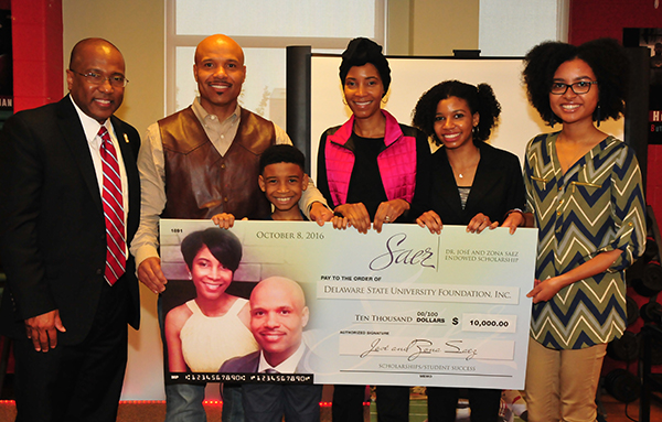 2016 Saez Scholarship Endowment -- former DSU President Harry L. Williams with the Saez family.