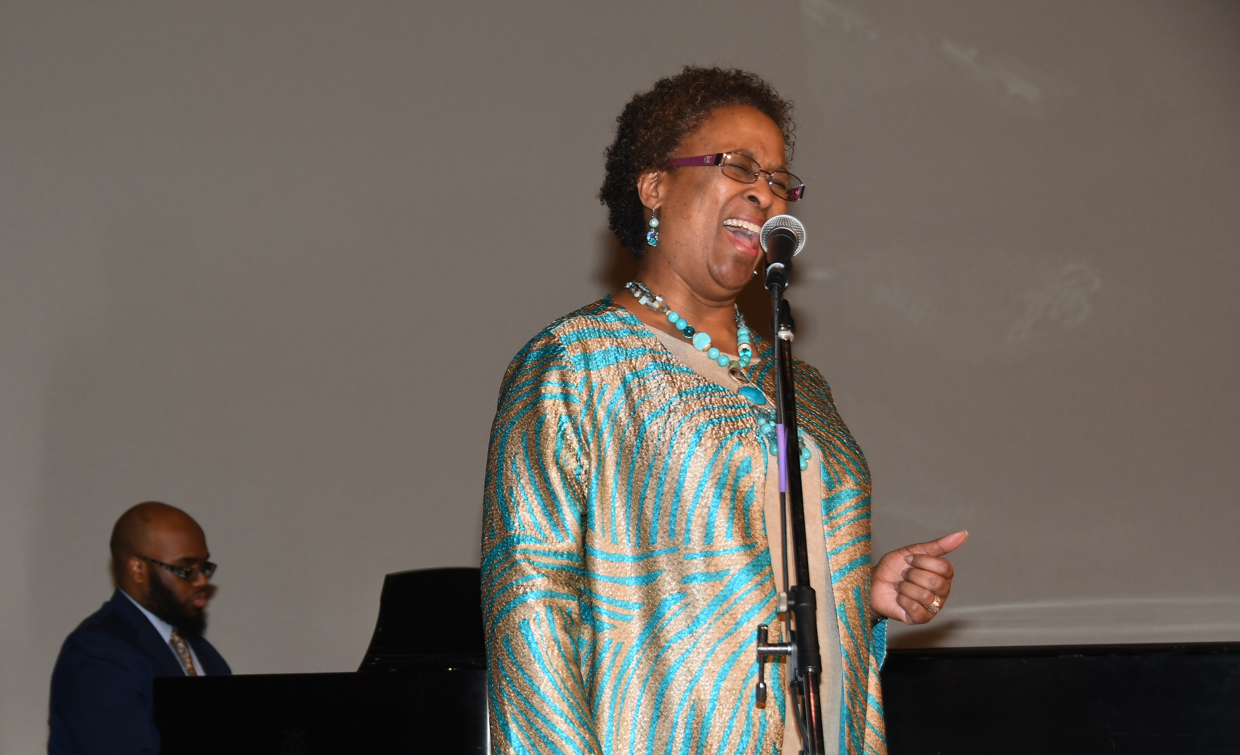 Dr. Marsha Horton, dean of the College of Health and Behavioral Sciences, puts on her music hat metaphorically and sings the National Anthem during the 33rd annual Martin Luther King Jr. National Holiday Program on campus. Photos by Judlin Pierre