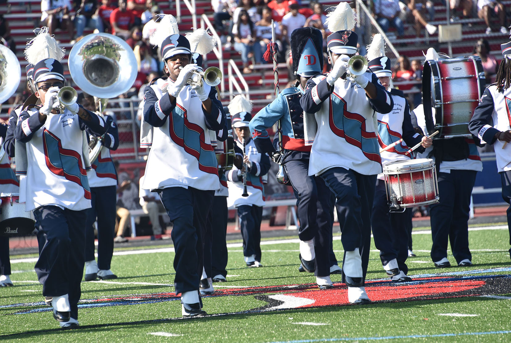 Former Approaching Storm members Sidney Sessoms and Vincent Adkins have been named as the new band director and assistant band director, respectively,  for Del States' premier marching band.