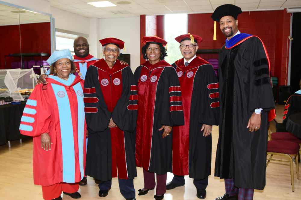 (L-r) Dr. Wilma Mishoe, Dr. Marlene Saunders, Dr. Debbie Harrington, Norman D. Griffith, Esq., and Convocation keynote speaker Isaiah Nathaniel. The Board of Trustees member and the University President posed with the Class of 2004 alumnus prior to the Sept. 24 Convocation Cerermony.