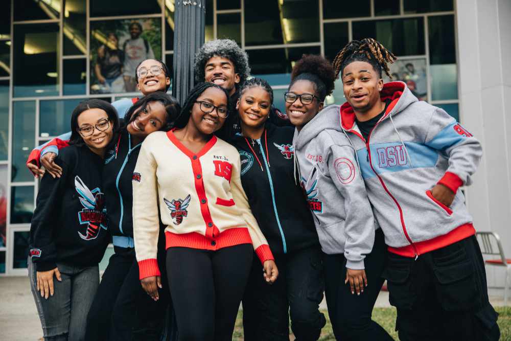 DSU students pose in the new University private merchandise hoodies, sweaters, and other apparel marketed on major online marketplaces such as Amazon and Walmart. DSU is the first and only HBCU to market its own private label merchandise. 