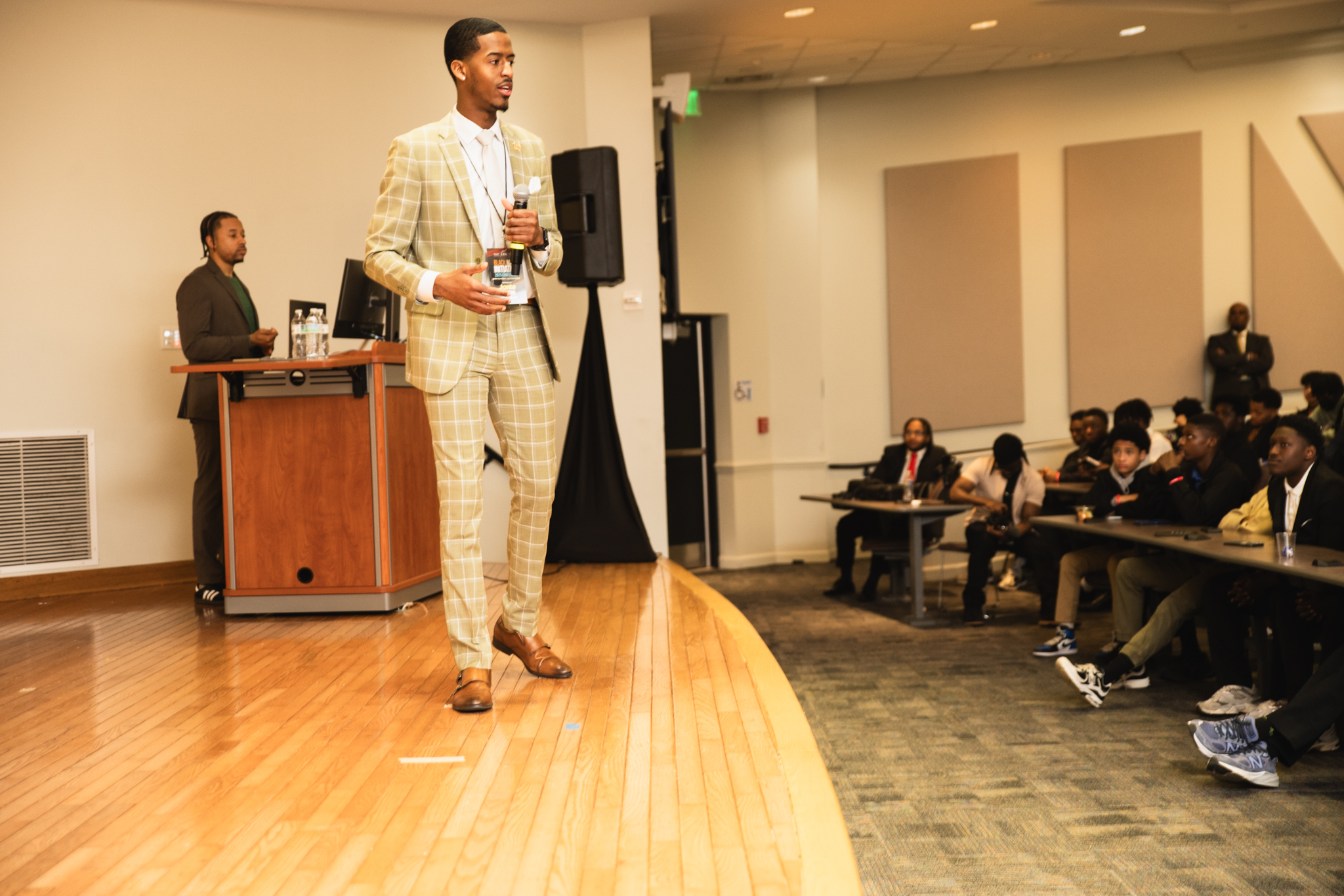 Jonte Simmons speaks with students at the Black Male Initiative Conference.